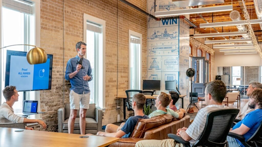 Professional team interaction illustrating systemic leadership and organizational growth through Horizon New Life consulting.